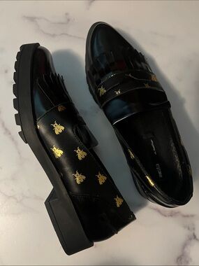 Miista Black Leather Bee-Print Kiltie Loafers